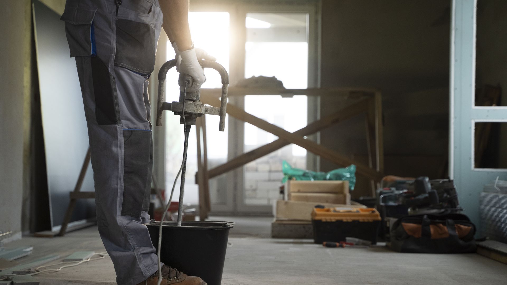 Floor screed being smoothed to a level finish