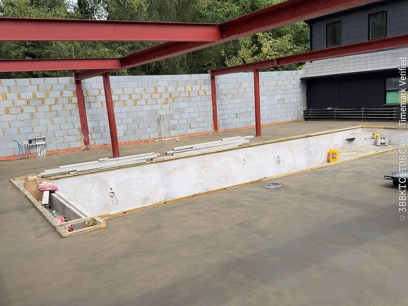 Steel-frame building — floor screeding by Johal Screeding Ltd