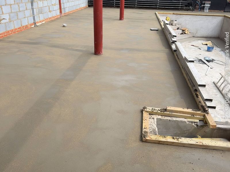 Screed around steel columns — floor screeding by Johal Screeding Ltd